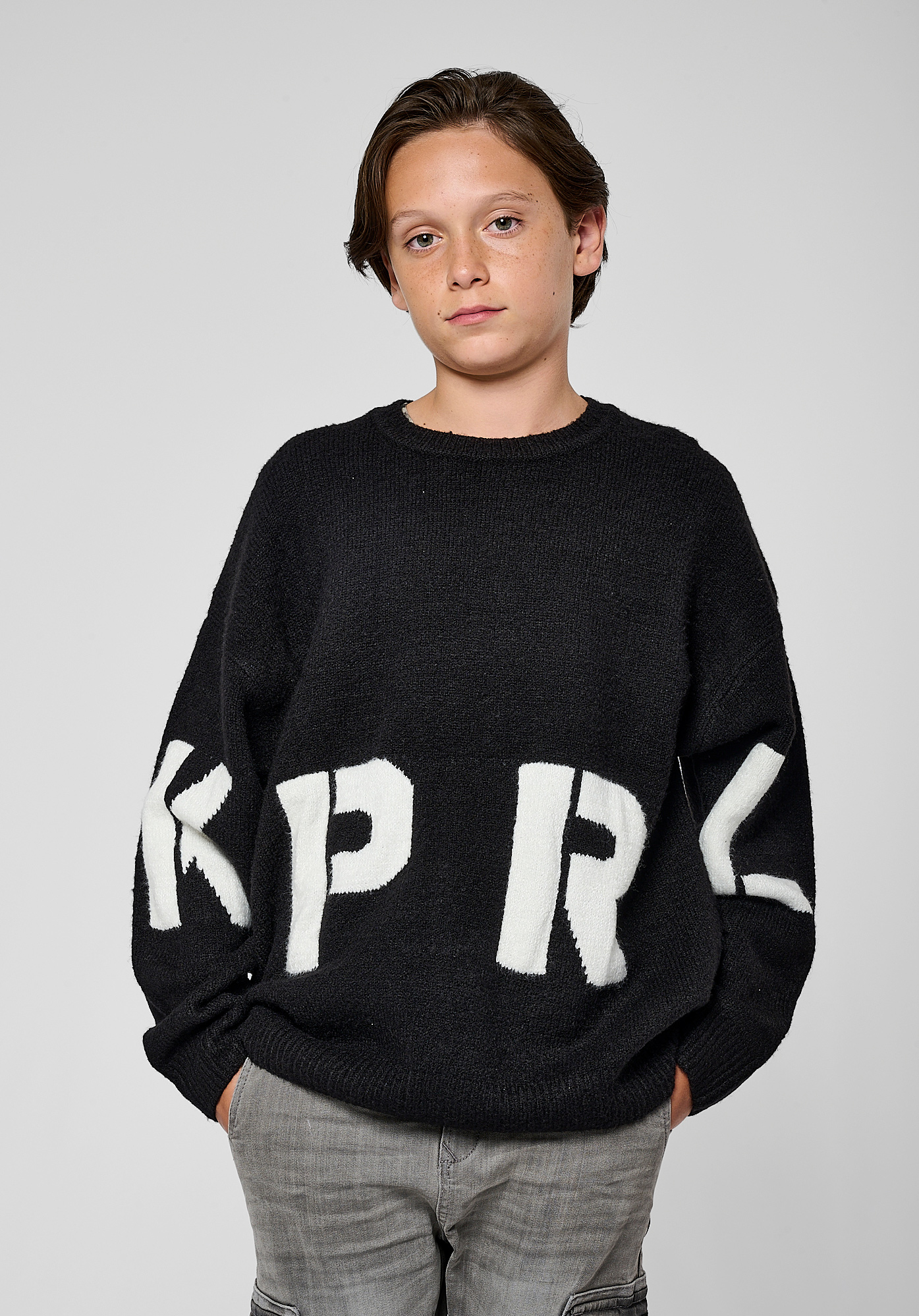 Pull noir Garcon Mochi Kaporal